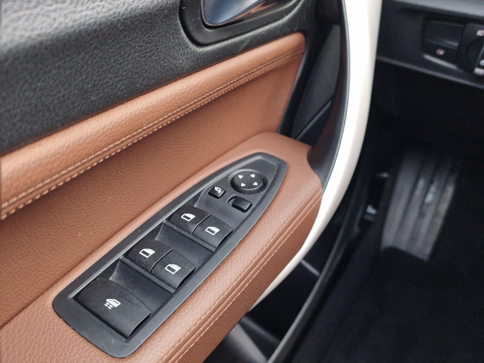 BMW 218 i Cabrio Aut./Leder/SHZ/Navi/PDC v.+h