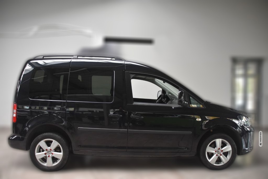Volkswagen Caddy 1.6 TDI Roncalli Klima Sitzheiz 7-Sitz PDC